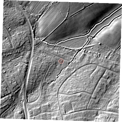 Shaded relief map of the ground around BN220RP, computed from Environment Agency LiDAR. The ground here sits at about 9 m above sea level and falls 12 m across the surrounding 800 m. Surface water reaching this point runs off ground lying to the south, 9.7 m higher.
