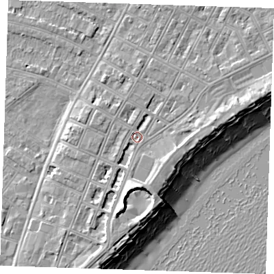 Shaded relief map of the ground around BN227AE, computed from Environment Agency LiDAR. The ground here sits at about 4 m above sea level and falls 12 m across the surrounding 800 m. Surface water reaching this point runs off ground lying to the south, 5.7 m higher.