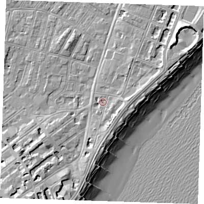 Shaded relief map of the ground around BN227AT, computed from Environment Agency LiDAR. The ground here sits at about 4 m above sea level and falls 13 m across the surrounding 800 m. Surface water reaching this point runs off ground lying to the south-south-east, 2.8 m higher.