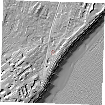 Shaded relief map of the ground around BN227FP, computed from Environment Agency LiDAR. The ground here sits at about 5 m above sea level and falls 14 m across the surrounding 800 m. Surface water reaching this point runs off ground lying to the east-north-east, 2.2 m higher.