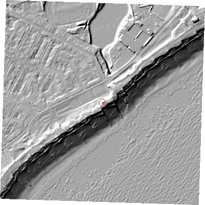 Shaded relief map of the ground around BN227LD, computed from Environment Agency LiDAR. The ground here sits at about 7 m above sea level and falls 13 m across the surrounding 800 m. Surface water reaching this point runs off ground lying to the south-south-west, 2.3 m higher.