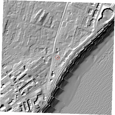 Shaded relief map of the ground around BN227NH, computed from Environment Agency LiDAR. The ground here sits at about 5 m above sea level and falls 13 m across the surrounding 800 m. Surface water reaching this point runs off ground lying to the east-south-east, 2.4 m higher.