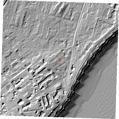 Shaded relief map of the ground around BN228AD, computed from Environment Agency LiDAR. The ground here sits at about 5 m above sea level and falls 14 m across the surrounding 800 m. Surface water reaching this point runs off ground lying to the west-south-west, 2.1 m higher.