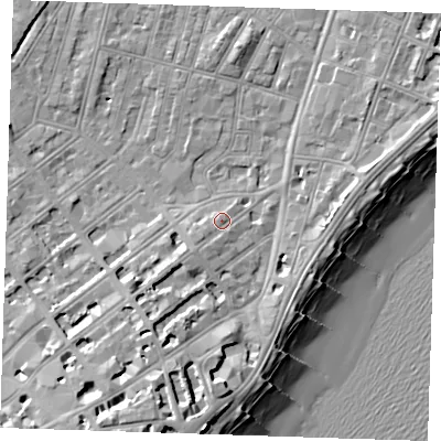 Shaded relief map of the ground around BN228AE, computed from Environment Agency LiDAR. The ground here sits at about 5 m above sea level and falls 14 m across the surrounding 800 m. Surface water reaching this point runs off ground lying to the south-west, 1.8 m higher.