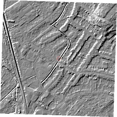 Shaded relief map of the ground around BN228TG, computed from Environment Agency LiDAR. The ground here sits at about 2 m above sea level and falls 8 m across the surrounding 800 m. Surface water reaching this point runs off ground lying to the east-north-east, 2.5 m higher.