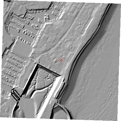 Shaded relief map of the ground around BN235AT, computed from Environment Agency LiDAR. The ground here sits at about 5 m above sea level and falls 12 m across the surrounding 800 m. Surface water reaching this point runs off ground lying to the south-east, 2.2 m higher.