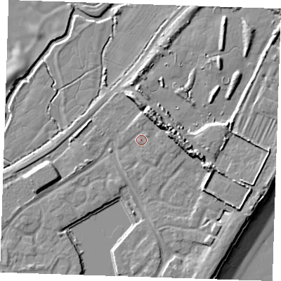 Shaded relief map of the ground around BN235BA, computed from Environment Agency LiDAR. The ground here sits at about 5 m above sea level and falls 13 m across the surrounding 800 m. Surface water reaching this point runs off ground lying to the north-north-east, 6.3 m higher.