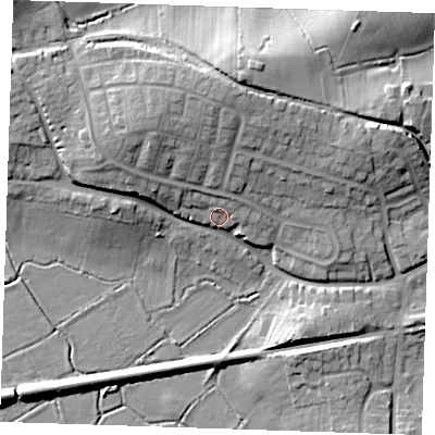 Shaded relief map of the ground around BN245DQ, computed from Environment Agency LiDAR. The ground here sits at about 9 m above sea level and falls 17 m across the surrounding 800 m. Surface water reaching this point runs off ground lying to the north-west, 5.2 m higher.
