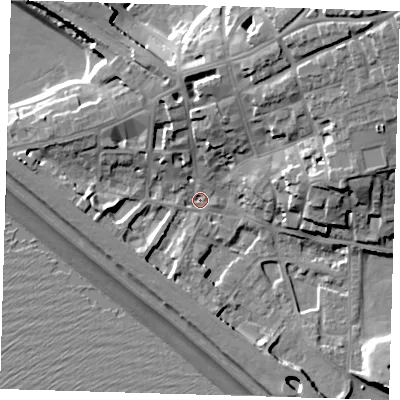 Shaded relief map of the ground around BN251HB, computed from Environment Agency LiDAR. The ground here sits at about 4 m above sea level and falls 24 m across the surrounding 800 m. Surface water reaching this point runs off ground lying to the north-north-east, 10.5 m higher.
