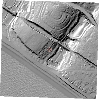 Shaded relief map of the ground around BN252QH, computed from Environment Agency LiDAR. The ground here sits at about 12 m above sea level and falls 34 m across the surrounding 800 m. Surface water reaching this point runs off ground lying to the north-north-west, 13.4 m higher.
