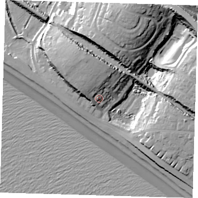 Shaded relief map of the ground around BN252QN, computed from Environment Agency LiDAR. The ground here sits at about 12 m above sea level and falls 33 m across the surrounding 800 m. Surface water reaching this point runs off ground lying to the north, 12.3 m higher.