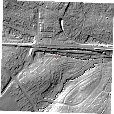 Shaded relief map of the ground around BN265AQ, computed from Environment Agency LiDAR. The ground here sits at about 11 m above sea level and falls 15 m across the surrounding 800 m. Surface water reaching this point runs off ground lying to the west, 10.5 m higher.