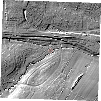 Shaded relief map of the ground around BN265AT, computed from Environment Agency LiDAR. The ground here sits at about 10 m above sea level and falls 15 m across the surrounding 800 m. Surface water reaching this point runs off ground lying to the south, 12.7 m higher.