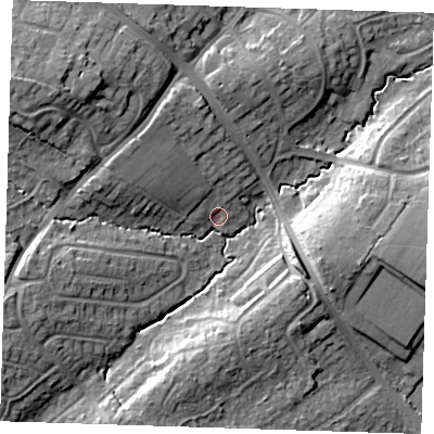 Shaded relief map of the ground around BN265DN, computed from Environment Agency LiDAR. The ground here sits at about 13 m above sea level and falls 18 m across the surrounding 800 m. Surface water reaching this point runs off ground lying to the west-north-west, 14.1 m higher.