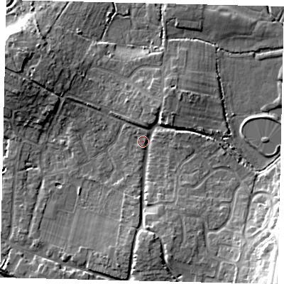 Shaded relief map of the ground around BN443JB, computed from Environment Agency LiDAR. The ground here sits at about 5 m above sea level and falls 22 m across the surrounding 800 m. Surface water reaching this point runs off ground lying to the south, 5.2 m higher.