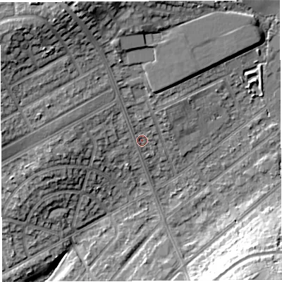 Shaded relief map of the ground around BS105SX, computed from Environment Agency LiDAR. The ground here sits at about 63 m above sea level and falls 21 m across the surrounding 800 m. Surface water reaching this point runs off ground lying to the north-west, 12.4 m higher.