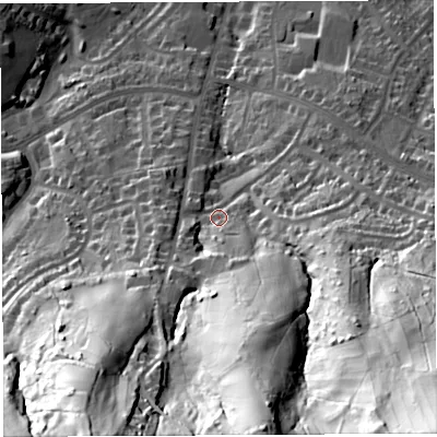 Shaded relief map of the ground around BS139DW, computed from Environment Agency LiDAR. The ground here sits at about 77 m above sea level and falls 94 m across the surrounding 800 m. Surface water reaching this point runs off ground lying to the south, 65.1 m higher.