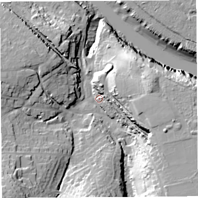 Shaded relief map of the ground around BS200ES, computed from Environment Agency LiDAR. The ground here sits at about 12 m above sea level and falls 40 m across the surrounding 800 m. Surface water reaching this point runs off ground lying to the south-west, 26.5 m higher.
