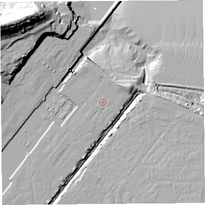 Shaded relief map of the ground around BS207QB, computed from Environment Agency LiDAR. The ground here sits at about 9 m above sea level and falls 65 m across the surrounding 800 m. Surface water reaching this point runs off ground lying to the east, 0.6 m higher.