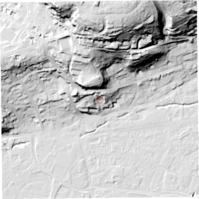 Shaded relief map of the ground around BS216BX, computed from Environment Agency LiDAR. The ground here sits at about 13 m above sea level and falls 63 m across the surrounding 800 m. Surface water reaching this point runs off ground lying to the north, 36.9 m higher.