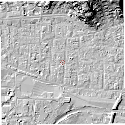 Shaded relief map of the ground around BS233AT, computed from Environment Agency LiDAR. The ground here sits at about 6 m above sea level and falls 22 m across the surrounding 800 m. Surface water reaching this point runs off ground lying to the south, 3.3 m higher.