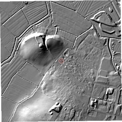 Shaded relief map of the ground around BS247DG, computed from Environment Agency LiDAR. The ground here sits at about 12 m above sea level and falls 19 m across the surrounding 800 m. Surface water reaching this point runs off ground lying to the north-west, 8.9 m higher.