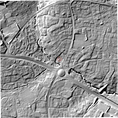 Shaded relief map of the ground around BS320BQ, computed from Environment Agency LiDAR. The ground here sits at about 64 m above sea level and falls 23 m across the surrounding 800 m. Surface water reaching this point runs off ground lying to the north-west, 17.0 m higher.
