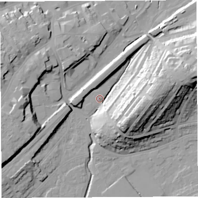 Shaded relief map of the ground around BS35BQ, computed from Environment Agency LiDAR. The ground here sits at about 11 m above sea level and falls 34 m across the surrounding 800 m. Surface water reaching this point runs off ground lying to the east, 32.7 m higher.