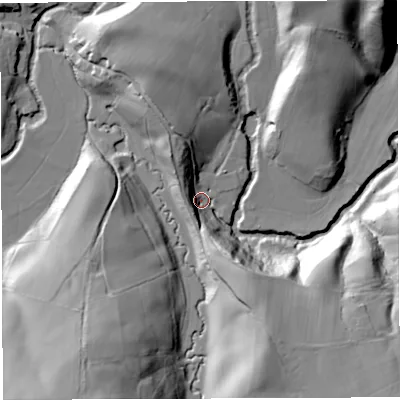 Shaded relief map of the ground around BS394JT, computed from Environment Agency LiDAR. The ground here sits at about 26 m above sea level and falls 44 m across the surrounding 800 m. Surface water reaching this point runs off ground lying to the north-north-west, 16.7 m higher.