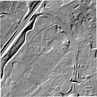 Shaded relief map of the ground around BS50TB, computed from Environment Agency LiDAR. The ground here sits at about 11 m above sea level and falls 16 m across the surrounding 800 m. Surface water reaching this point runs off ground lying to the south-east, 10.4 m higher.