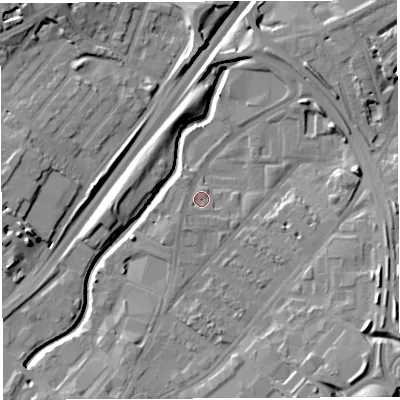 Shaded relief map of the ground around BS50UX, computed from Environment Agency LiDAR. The ground here sits at about 12 m above sea level and falls 15 m across the surrounding 800 m. Surface water reaching this point runs off ground lying to the south-west, 1.5 m higher.