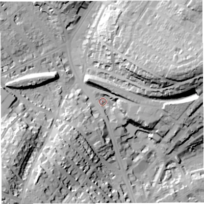 Shaded relief map of the ground around BS65RA, computed from Environment Agency LiDAR. The ground here sits at about 26 m above sea level and falls 53 m across the surrounding 800 m. Surface water reaching this point runs off ground lying to the south-south-west, 14.7 m higher.