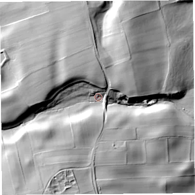 Shaded relief map of the ground around CA101BY, computed from Environment Agency LiDAR. The ground here sits at about 115 m above sea level and falls 46 m across the surrounding 800 m. Surface water reaching this point runs off ground lying to the west, 24.4 m higher.