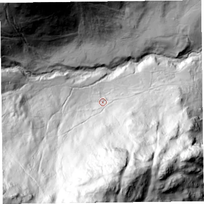 Shaded relief map of the ground around CA110QT, computed from Environment Agency LiDAR. The ground here sits at about 222 m above sea level and falls 293 m across the surrounding 800 m. Surface water reaching this point runs off ground lying to the south, 205.0 m higher.