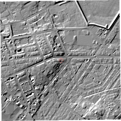 Shaded relief map of the ground around CA11JU, computed from Environment Agency LiDAR. The ground here sits at about 18 m above sea level and falls 9 m across the surrounding 800 m. Surface water reaching this point runs off ground lying to the west, 5.1 m higher.