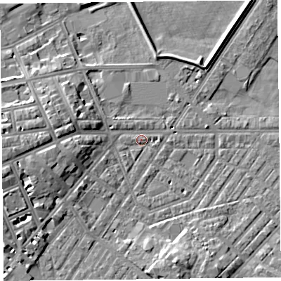 Shaded relief map of the ground around CA11LF, computed from Environment Agency LiDAR. The ground here sits at about 16 m above sea level and falls 9 m across the surrounding 800 m. Surface water reaching this point runs off ground lying to the west, 6.8 m higher.