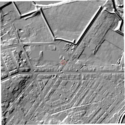 Shaded relief map of the ground around CA11LT, computed from Environment Agency LiDAR. The ground here sits at about 15 m above sea level and falls 12 m across the surrounding 800 m. Surface water reaching this point runs off ground lying to the west, 5.6 m higher.
