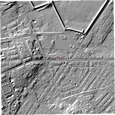 Shaded relief map of the ground around CA11LU, computed from Environment Agency LiDAR. The ground here sits at about 16 m above sea level and falls 9 m across the surrounding 800 m. Surface water reaching this point runs off ground lying to the west, 4.9 m higher.