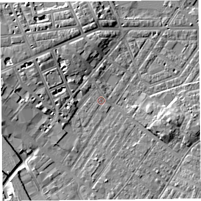 Shaded relief map of the ground around CA12AA, computed from Environment Agency LiDAR. The ground here sits at about 18 m above sea level and falls 9 m across the surrounding 800 m. Surface water reaching this point runs off ground lying to the west, 2.7 m higher.