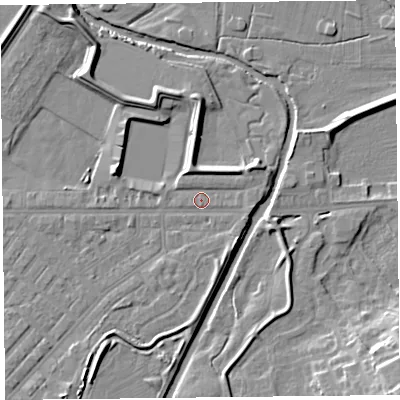 Shaded relief map of the ground around CA12BX, computed from Environment Agency LiDAR. The ground here sits at about 15 m above sea level and falls 14 m across the surrounding 800 m. Surface water reaching this point runs off ground lying to the east-north-east, 2.5 m higher.