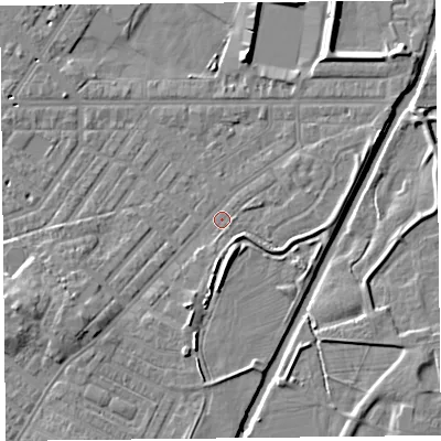 Shaded relief map of the ground around CA12DB, computed from Environment Agency LiDAR. The ground here sits at about 16 m above sea level and falls 9 m across the surrounding 800 m. Surface water reaching this point runs off ground lying to the south-west, 4.2 m higher.