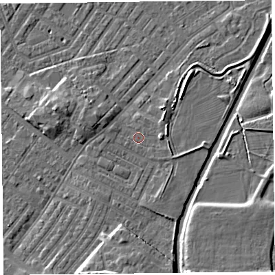 Shaded relief map of the ground around CA12DQ, computed from Environment Agency LiDAR. The ground here sits at about 18 m above sea level and falls 11 m across the surrounding 800 m. Surface water reaching this point runs off ground lying to the south-south-west, 7.1 m higher.