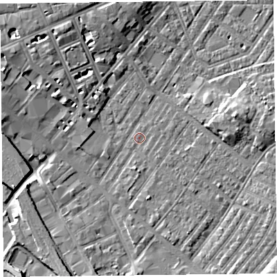 Shaded relief map of the ground around CA12ED, computed from Environment Agency LiDAR. The ground here sits at about 18 m above sea level and falls 8 m across the surrounding 800 m. Surface water reaching this point runs off ground lying to the west-north-west, 5.5 m higher.