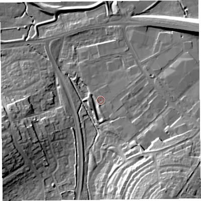 Shaded relief map of the ground around CA12FT, computed from Environment Agency LiDAR. The ground here sits at about 18 m above sea level and falls 25 m across the surrounding 800 m. Surface water reaching this point runs off ground lying to the south-east, 13.4 m higher.