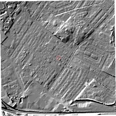 Shaded relief map of the ground around CA12HT, computed from Environment Agency LiDAR. The ground here sits at about 18 m above sea level and falls 13 m across the surrounding 800 m. Surface water reaching this point runs off ground lying to the south-west, 1.7 m higher.