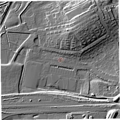 Shaded relief map of the ground around CA12TJ, computed from Environment Agency LiDAR. The ground here sits at about 18 m above sea level and falls 21 m across the surrounding 800 m. Surface water reaching this point runs off ground lying to the north-east, 2.4 m higher.