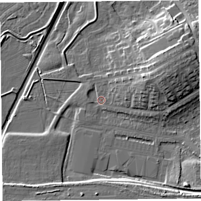 Shaded relief map of the ground around CA12TT, computed from Environment Agency LiDAR. The ground here sits at about 18 m above sea level and falls 15 m across the surrounding 800 m. Surface water reaching this point runs off ground lying to the east-north-east, 11.3 m higher.
