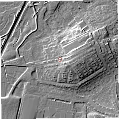 Shaded relief map of the ground around CA12TX, computed from Environment Agency LiDAR. The ground here sits at about 23 m above sea level and falls 15 m across the surrounding 800 m. Surface water reaching this point runs off ground lying to the east, 6.9 m higher.
