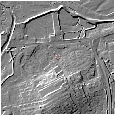 Shaded relief map of the ground around CA12UE, computed from Environment Agency LiDAR. The ground here sits at about 15 m above sea level and falls 17 m across the surrounding 800 m. Surface water reaching this point runs off ground lying to the south, 14.4 m higher.