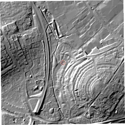 Shaded relief map of the ground around CA12XD, computed from Environment Agency LiDAR. The ground here sits at about 18 m above sea level and falls 23 m across the surrounding 800 m. Surface water reaching this point runs off ground lying to the south-east, 19.3 m higher.